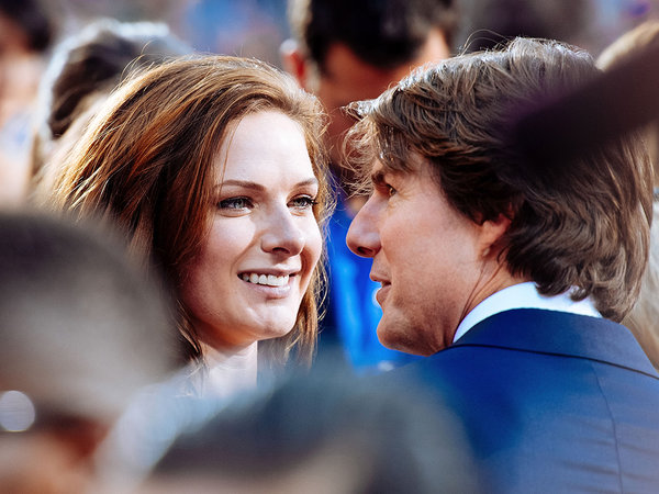 Rebecca Ferguson looks adoringly at Tom Cruise