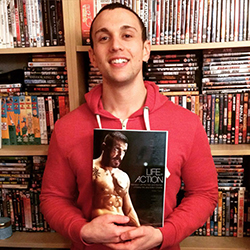 Mike Fury holding his book Life of Action