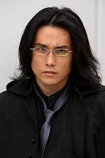 Tak Sakaguchi with glasses and long hair