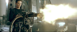 The Matrix movie Neo opens fire with Gatling gun
