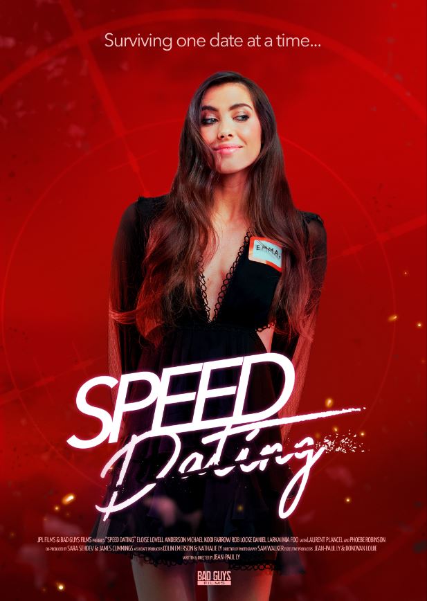 Speeding Dating action short movie poster, featuring attractive brunette with long hair in short revealing black dress, against a blood red background with a target scope. She is wearing a red-bordered white nametag with the name EMMA writen in all caps. Her pose is innocent, arms behind her back, but the slant and the slice of the title SPEED DATING suggests action. The tagline reads Surviving one date at a time...