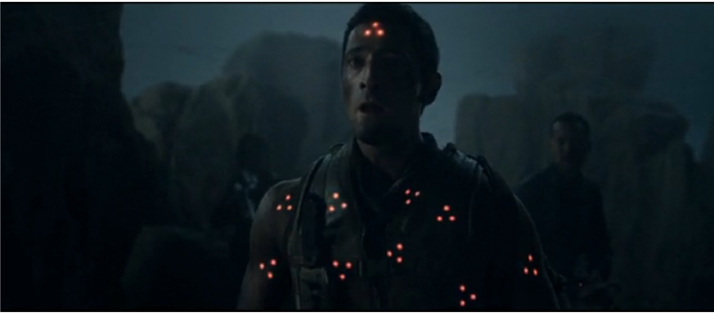 Adrien Brody as target in PREDATORS with multiple red dots
