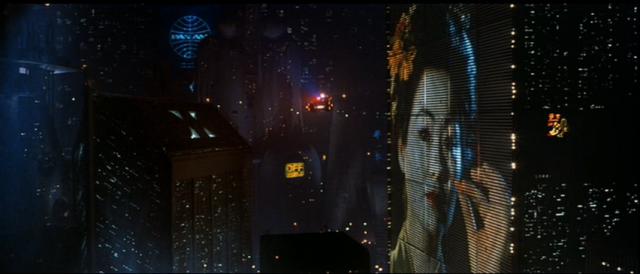 image of geisha on side of skyscraper in Blade Runner