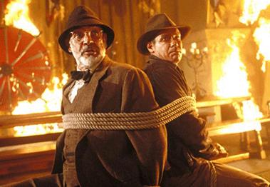 Sean Connery and Harrison Ford tied together in the fire scene in Indiana Jones and The Last Crusade