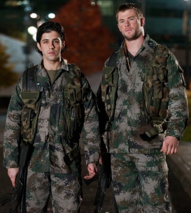Josh Peck and Chris Hemsworth in fitigues in Red Dawn 2012