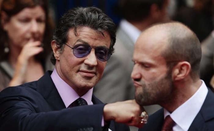 Sylvester Stallone play punching Jason Statham on the jaw